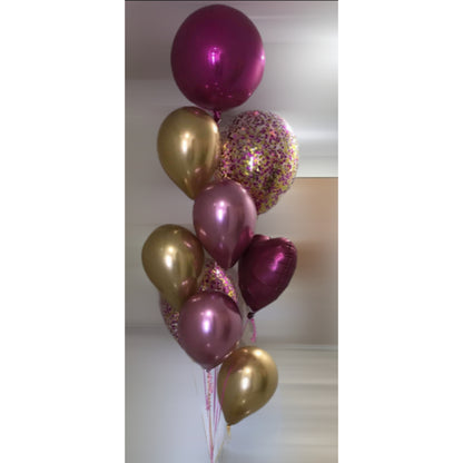 Pink and gold confetti and Orbz helium balloon arrangement